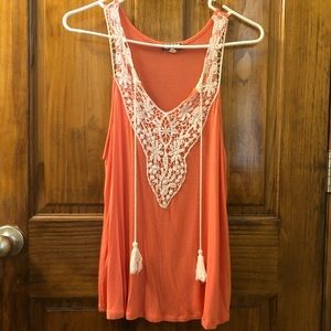 Tank top with a lacy front and tassels